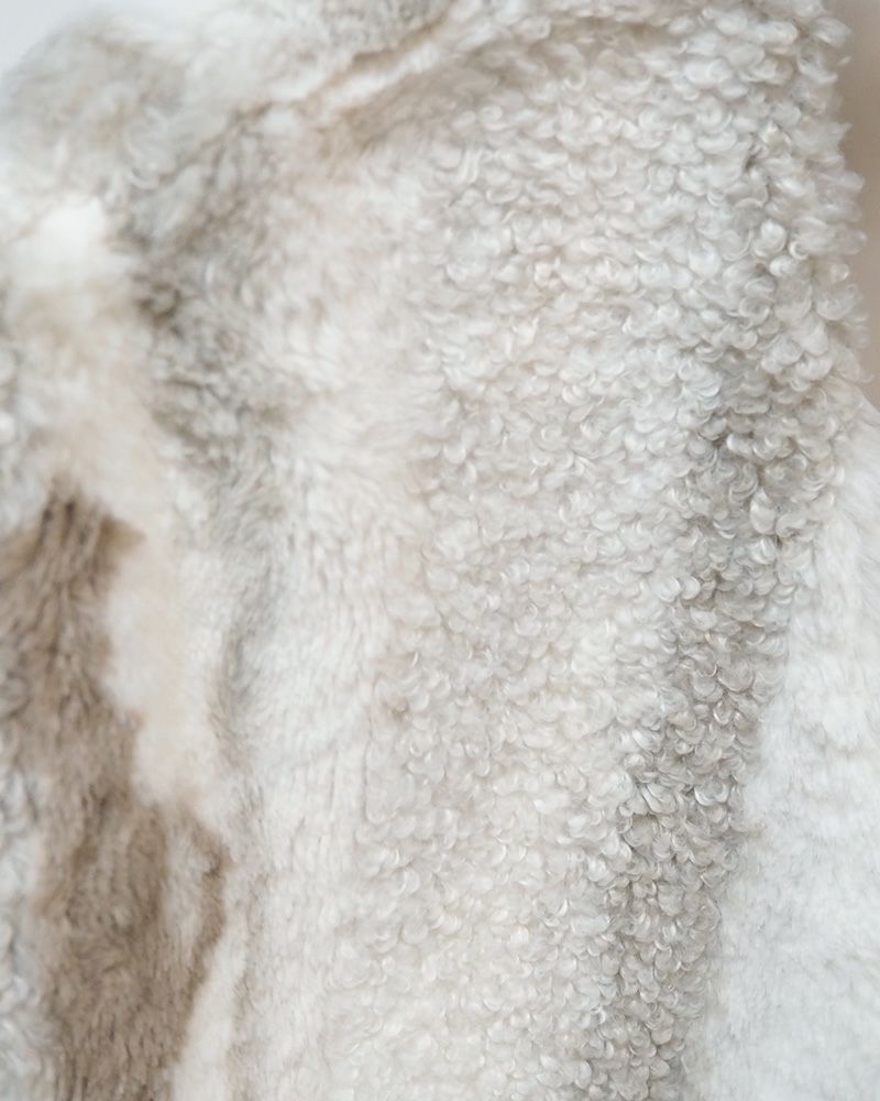 limiless アソート柄ボアベスト