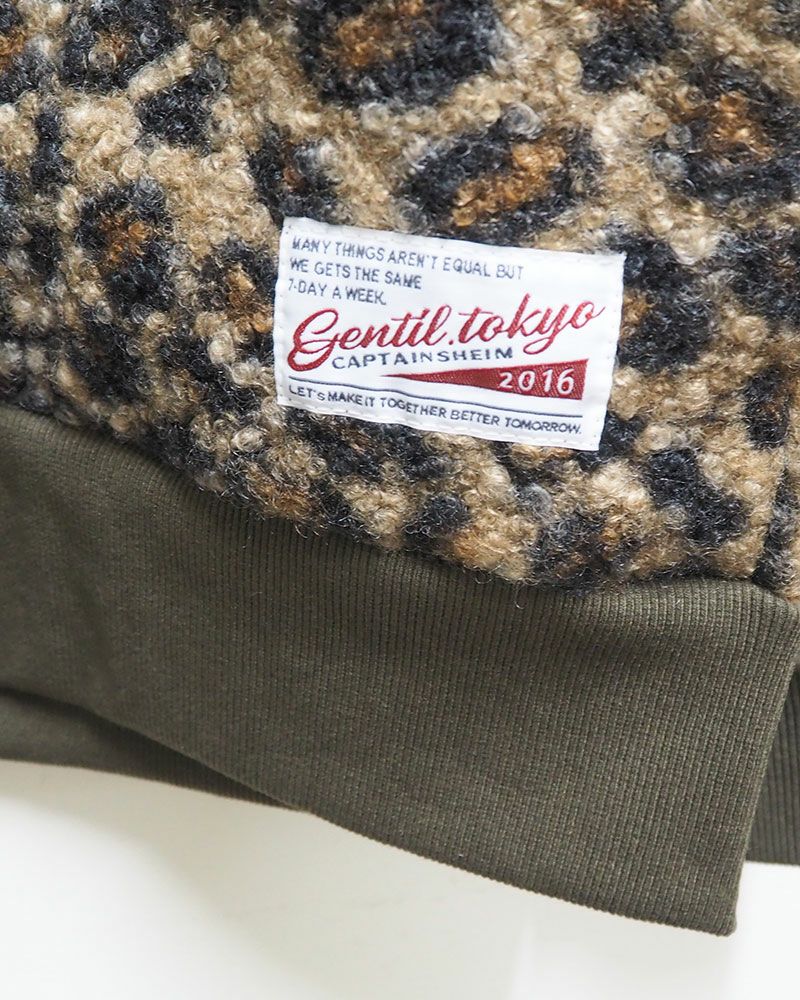 リングドットボタンをあしらった軽量ボアカーディガン。豊富なカラーバリエーションでデイリーに活躍する一枚