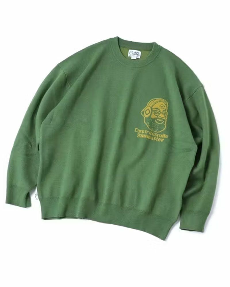 gym master（ジムマスター）のcarefree smile ジャガードニットクルーネック。笑顔モチーフをジャガードで表現したグレー・ブラック・グリーンの3色展開ニット。
